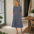 Astrid | Blomstret Midikjole med Naturlig Elegance