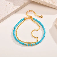 Strålende Guldarmbånd med Turkis